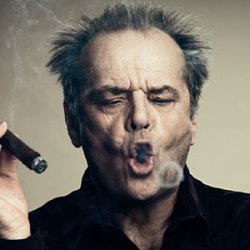 A picture of Jack Nicholson smoking a cigar and blowing a smoke ring.